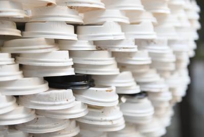 Disposable coffee lids at MLC Centre 