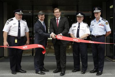 Minister for Emergency Services, Troy Grant, cuts the ribbon alongside Jamie Nelson (GPT) Commissioner Shane Fitzsimmons and Commissioner Mark Smethurst.